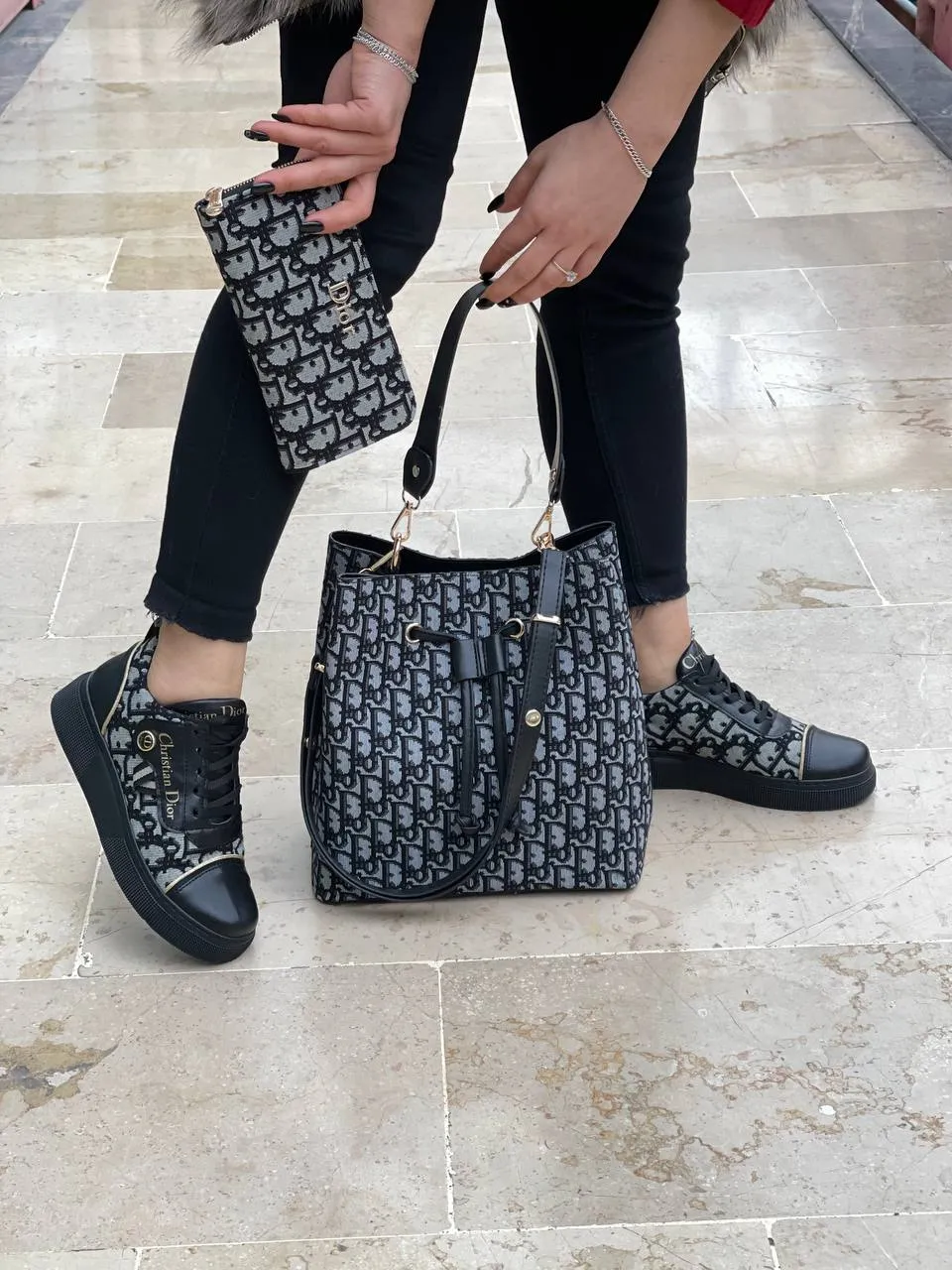 Shoe bag set with christian D written next to the shoes